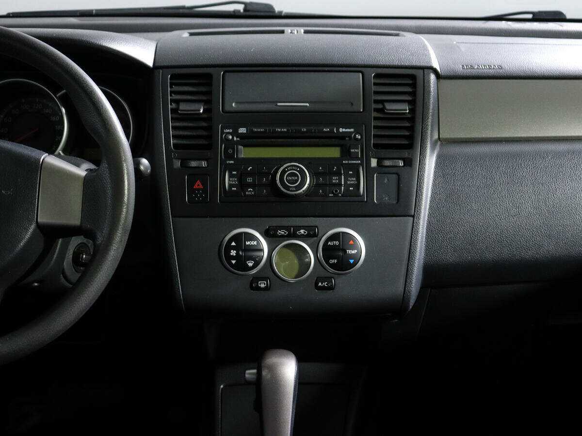 Nissan Tiida, 2011 Фото №11