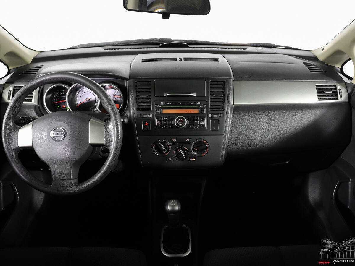 Nissan Tiida, 2011 Фото №11