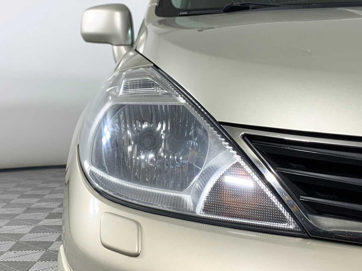 Nissan Tiida, 2010 Фото №9