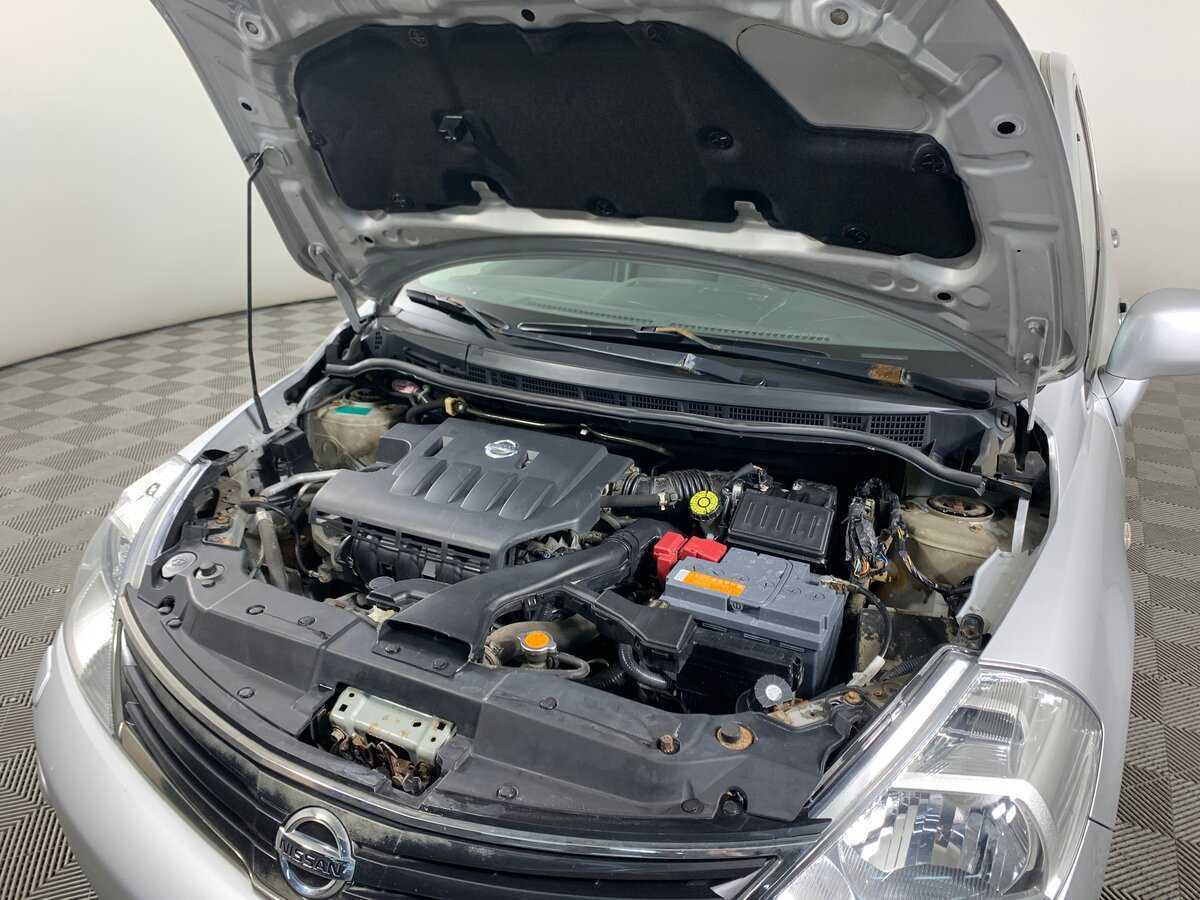 Nissan Tiida, 2011 Фото №11