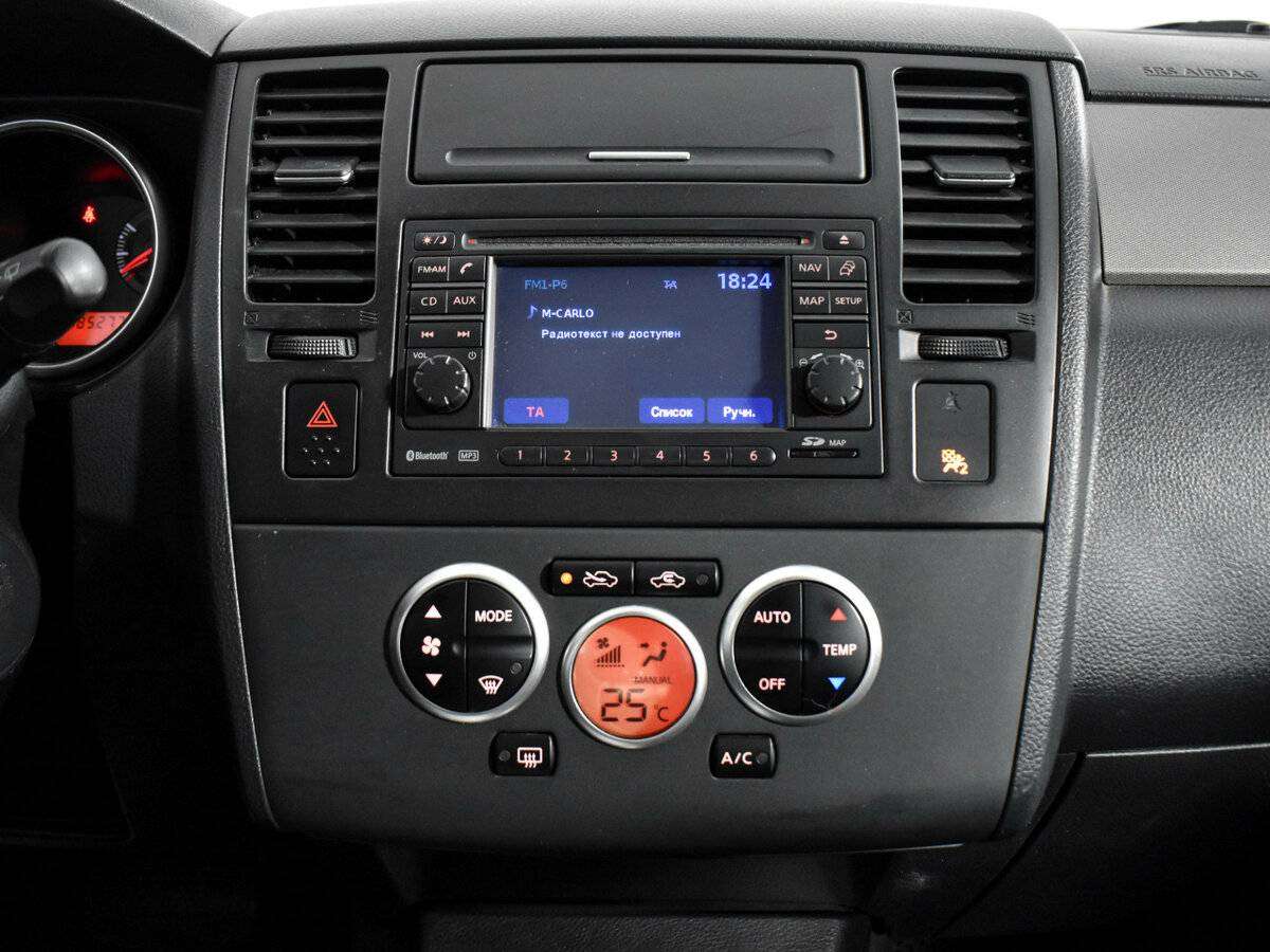 Nissan Tiida, 2010 Фото №14